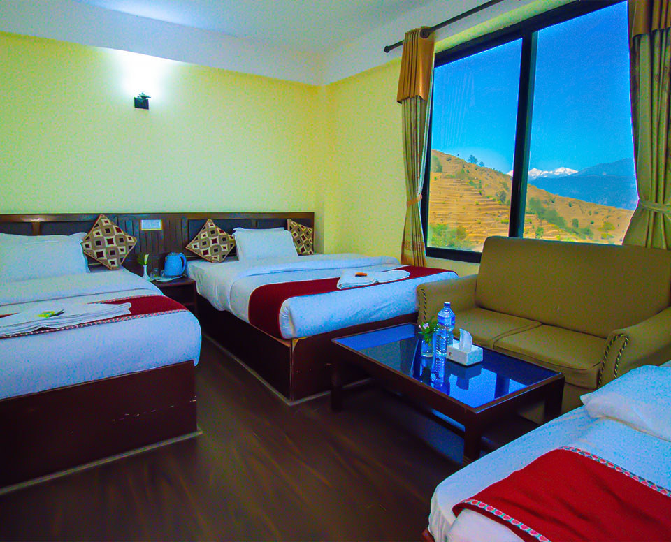 Ganesh Himal Room accommodates 5-6 people with it's 2 King Size and 1 Double Bed.